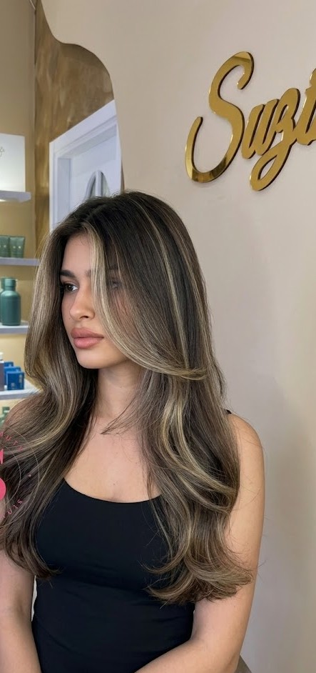 Lang haar met highlights, gestyled in de salon